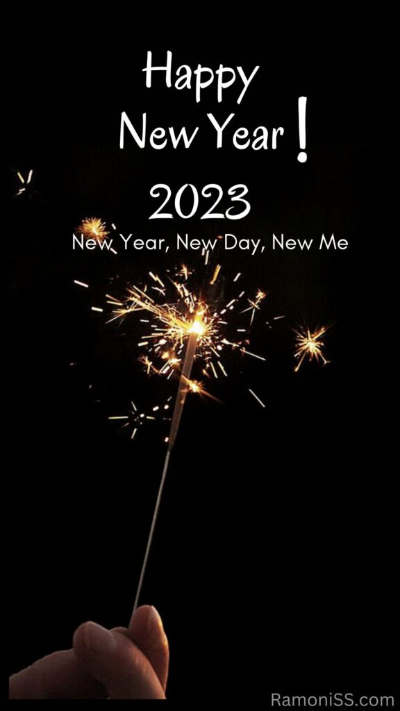 Happy new year 2023 diary image template in white font on black background and sparkler in hand.