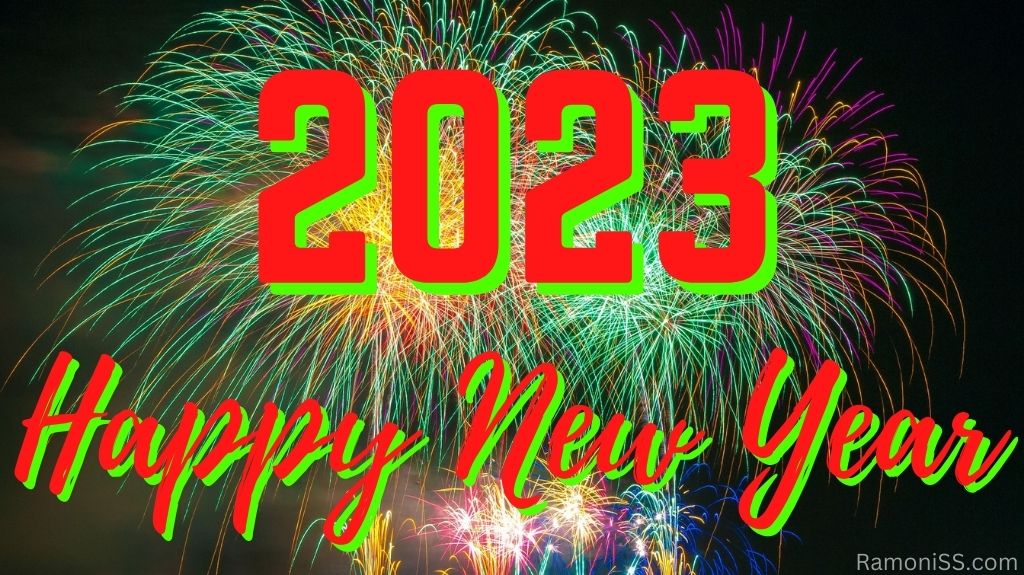 Happy new year 2023 on black background with bright colorful fireworks in the sky using red color font.