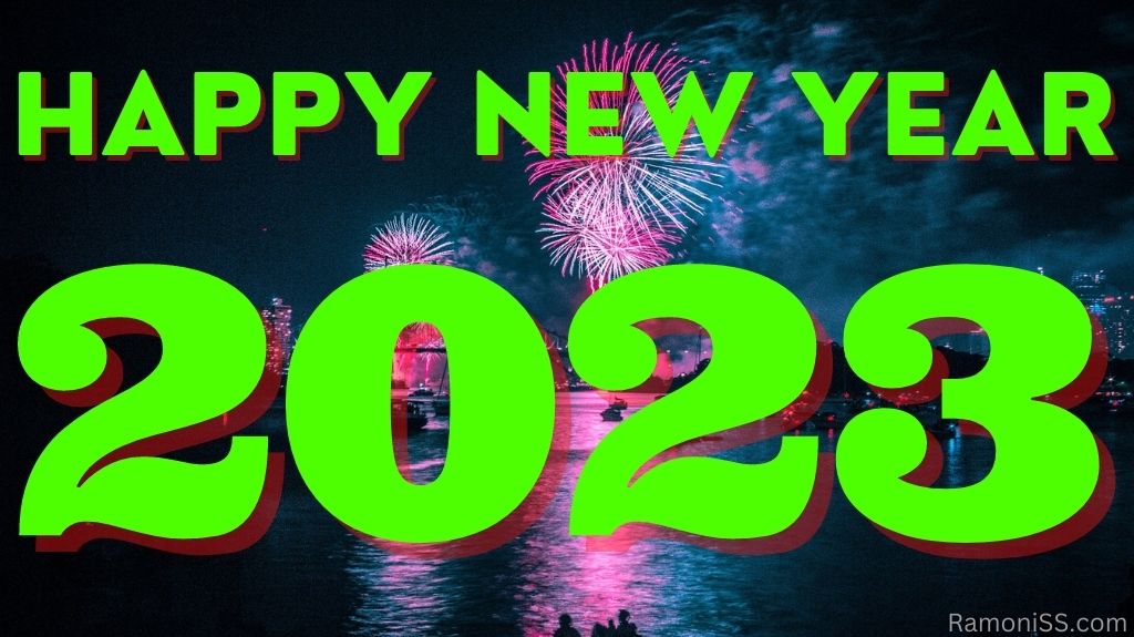Happy new year 2023 on bright colorful fireworks background in the sky using green font.