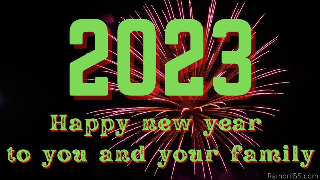 Happy new year 2023 to you and your family with bright colorful fireworks in the sky background