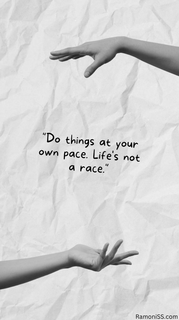 Do things at your own pace. Life's not a race. Two hands and white background motivational image.