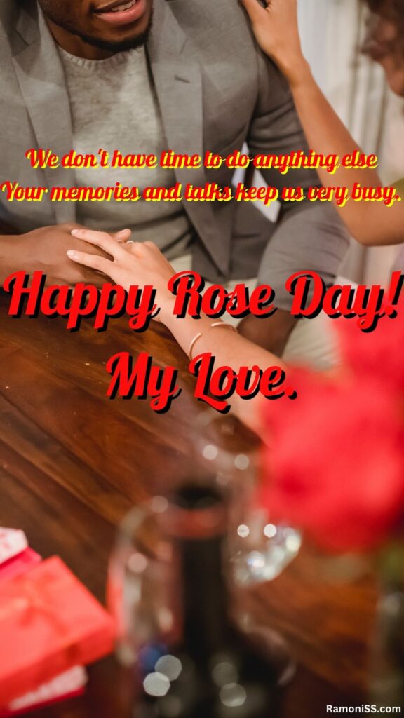 In the photo, a boy is sitting holding his girlfriend's hand and is wishing his girlfriend a very happy rose day.