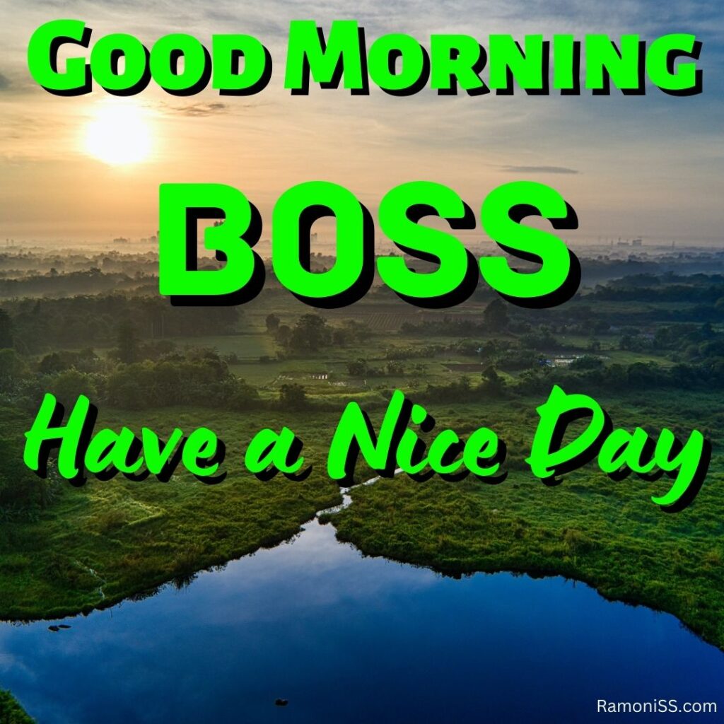 Good morning boss written in the image and in the background of the photo is a view of the lake and forest trees.