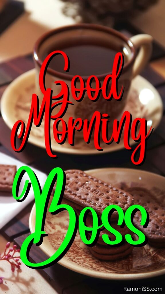 Good morning boss written in the image and in the background image on the table black tea and biscuits are placed on the plates.