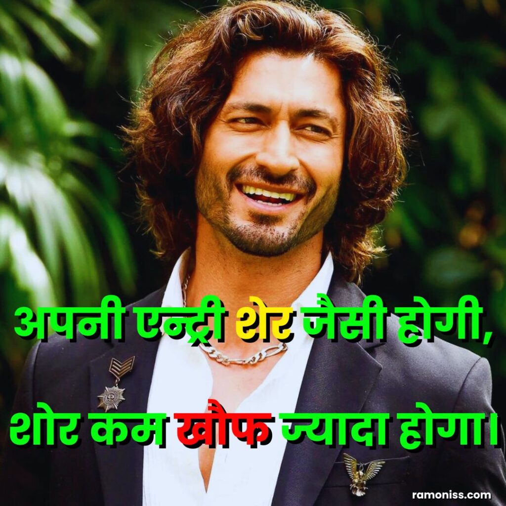 Vidyut jammwal bollywood actor wearing a black coat smiling and giving an attitude pose, attitude status for boys in hindi image