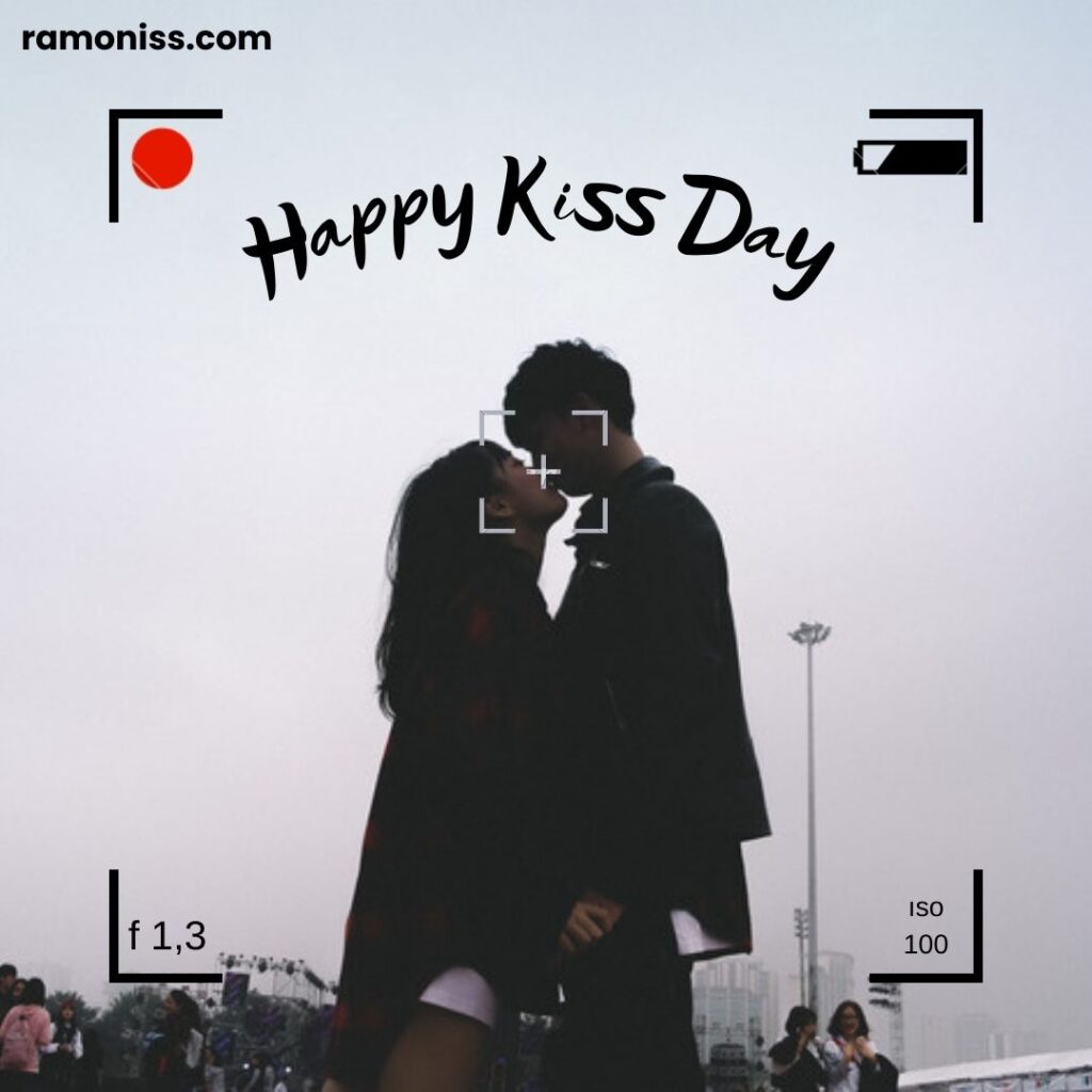 Love couple kissing each other in a public place on the road valentine's happy kiss day images