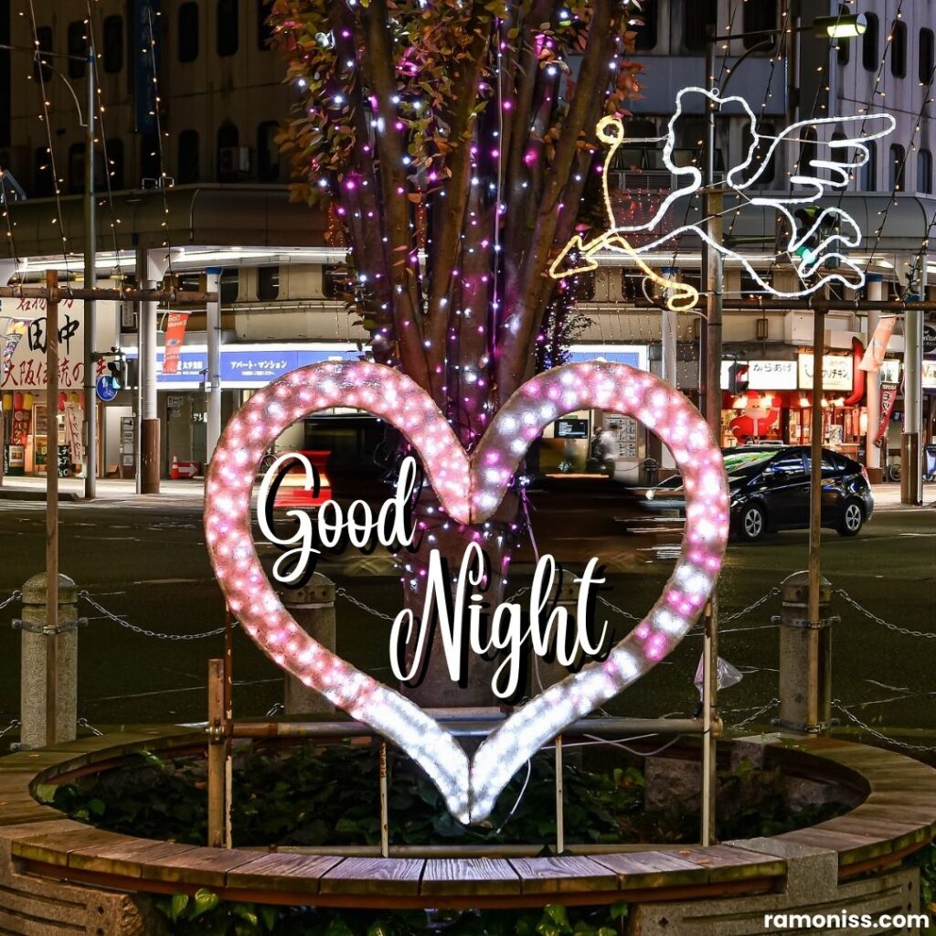 Heart and tree decorated with lights good night images with love.