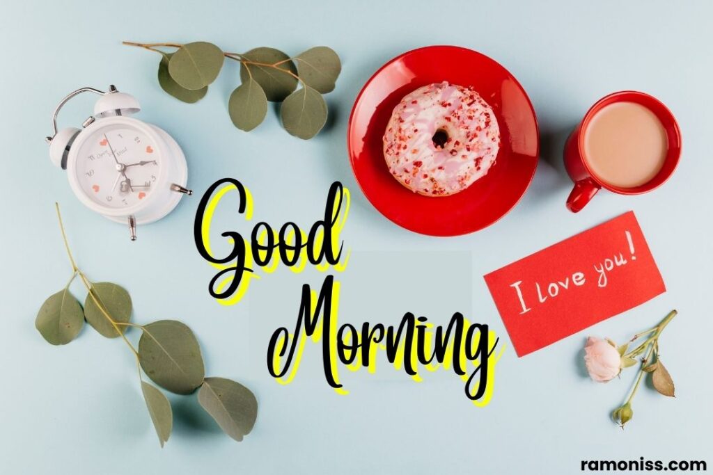I love you note doughnut breakfast alarm clock and rose flower with leaves are placed on sky colour surface good morning images love.