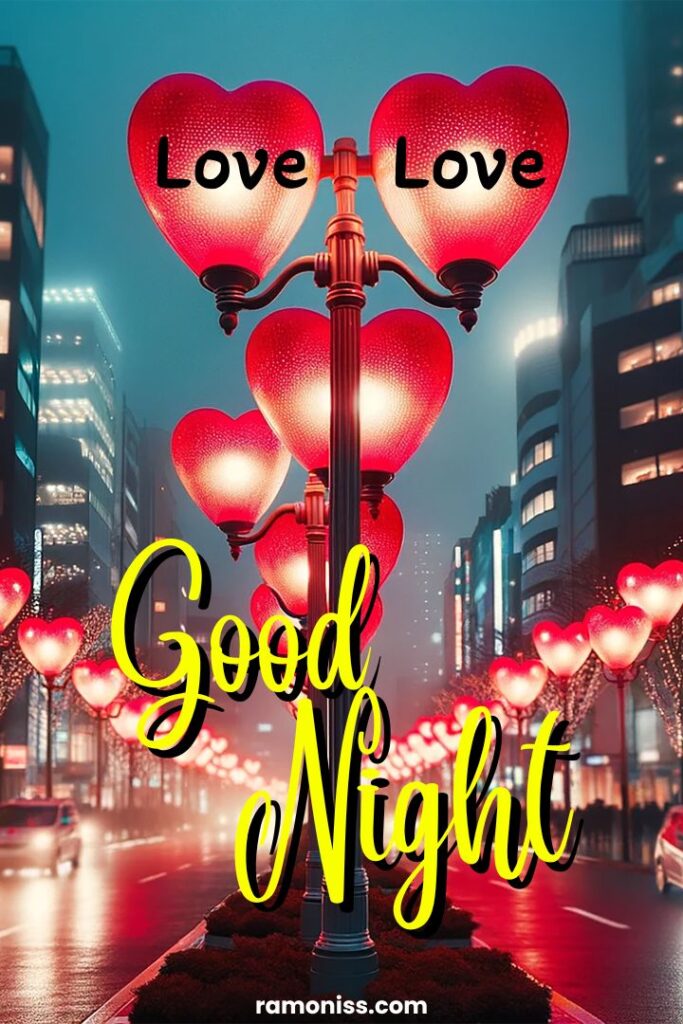 Street lights with red heart design burning on the road at night beautiful good night images for your love.